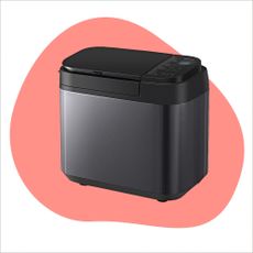 Panasonic bread maker on pink background