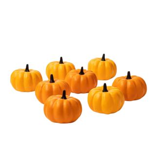 A cluster of small plastic pumpkins