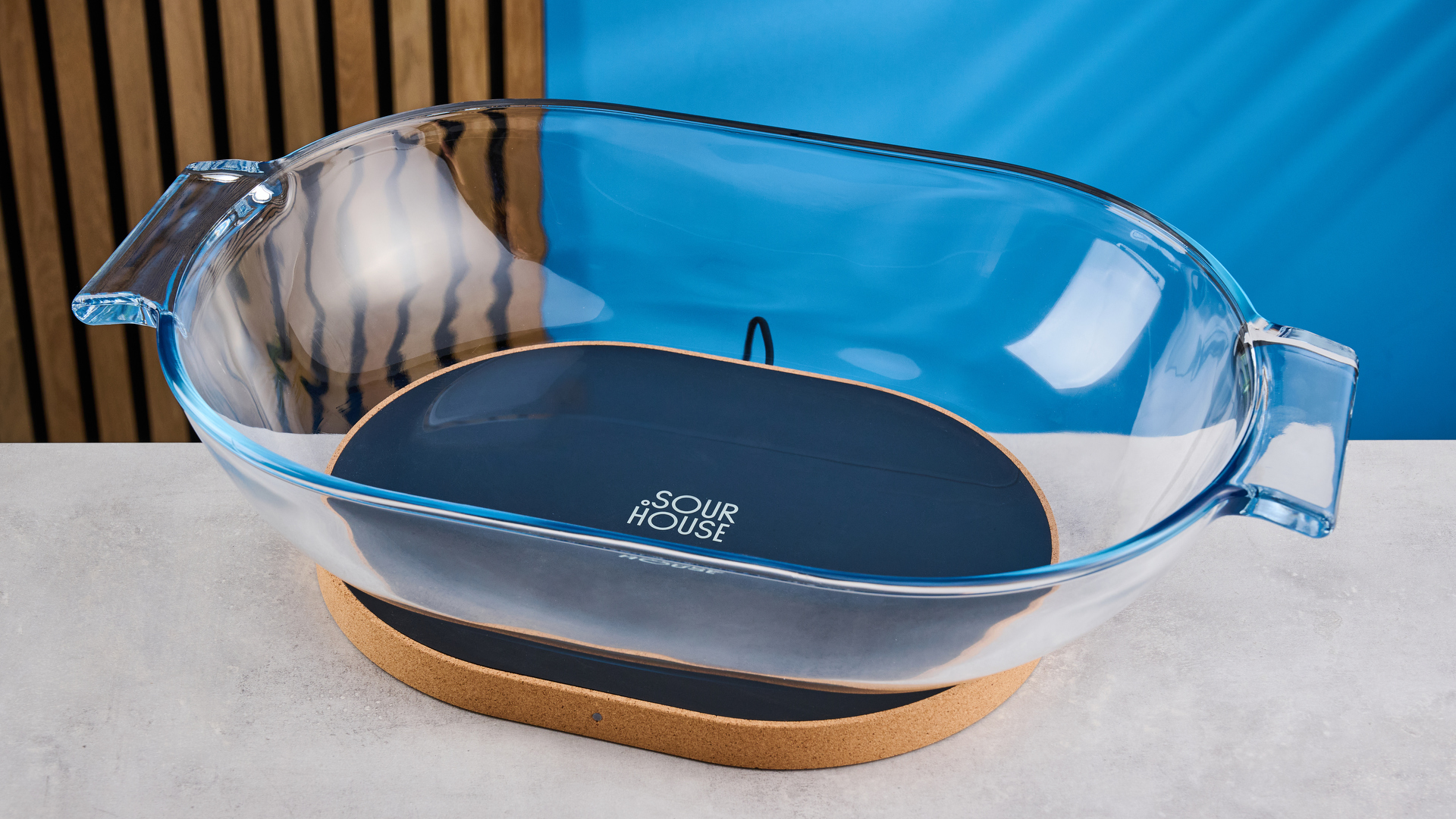 the Sourhouse DoughBed sourdough bulk fermentation proofing basket with a glass proofing bowl and an electric heating warming mat for even proofing