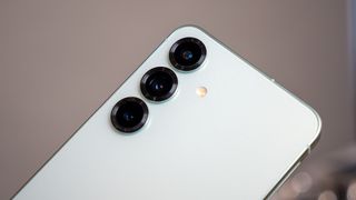 A close-up of the camera lenses on the Samsung Galaxy S25 Plus