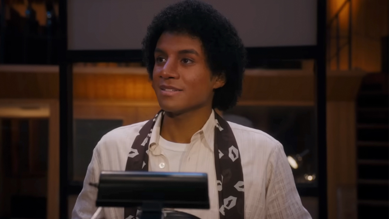 Jafaar Jackson smiling in Michael, in a recording studio