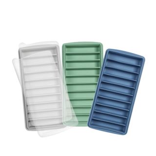Three rectangular ice cube trays with rectangular grooves - one light gray, one mint green, and one dark blue
