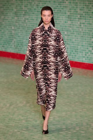 a runway image of the peep-toe shoe trend in the Tory Burch spring 2025 collection