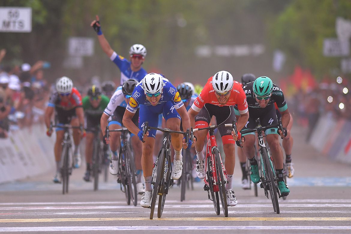 Alvaro Hodeg with the early celebration for teammate Max Richeze (Quick-Step Floors)