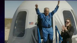 Ed Dwight emerges from Blue Origin's New Shepard capsule after a suborbital flight on May 19, 2024.
