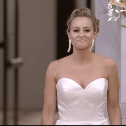 Dress, Gown, Hair, Wedding dress, Bride, Clothing, Bridal clothing, Shoulder, Hairstyle, Bridal accessory, 