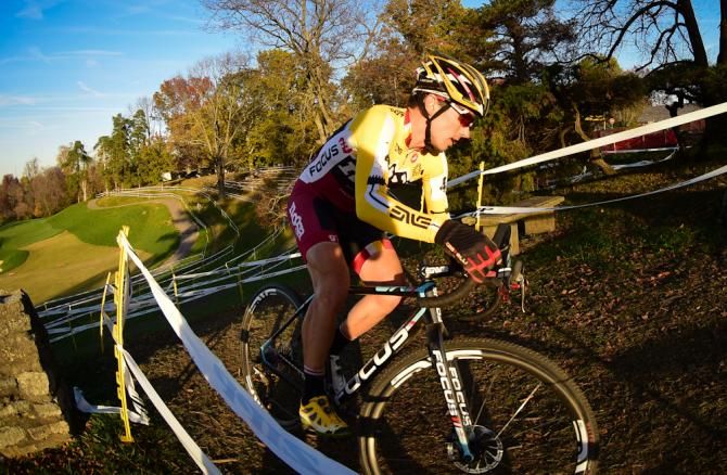 Allen Krughoff (Noosa Pro Team) rounding a corner next to the golf course