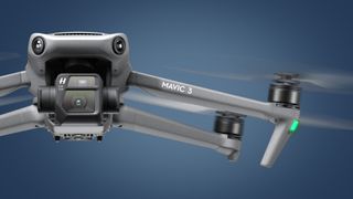 The DJI Mavic 3 drone in flight on a blue background