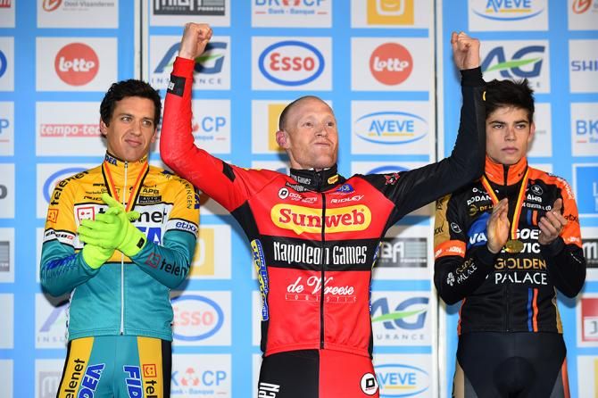 Klaas Vantornaout on the podium with Tom Meeusen and Wout Van Aert.