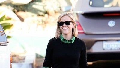 Reese Witherspoon smiling with new bob haircut.
