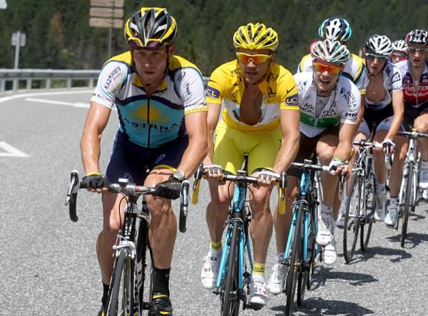 Lance Armstrong (Astana) ahead of race leader Rinaldo Nocentini (AG2R La Mondiale) in stage eight of the Tour de France
