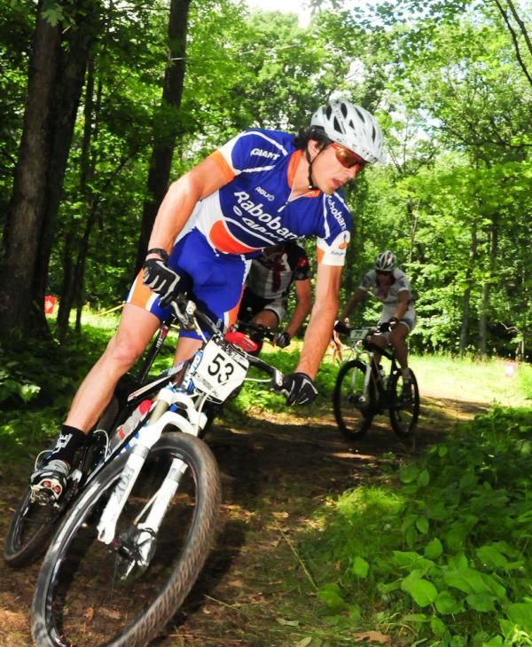 Adam Craig (Rabobank-Giant) cornering in the woods.