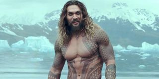 Shirtless Jason Momoa in water in Aquaman DC Warner Bros.