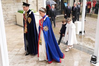 Prince William, Prince of Wales and Catherine, Princess of Wales with Prince Louis and Princess Charlotte arrive ahead of the Coronation of King Charles III and Queen Camilla on May 6, 2023 in London, England