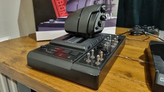 The Hori HOTAS twin throttle control system on a desk