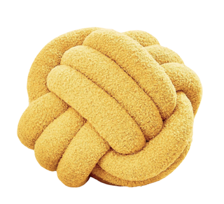 yellow knotted ball pillow
