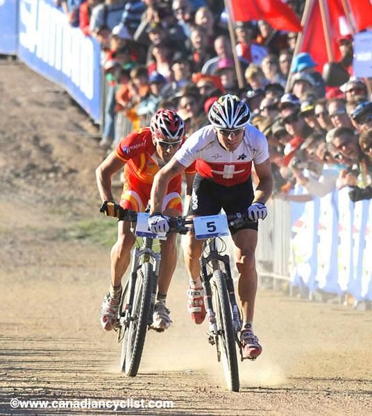 Florian Vogel (Switzerland) and Jose Hermida (Spain) drag race down the final stretch.