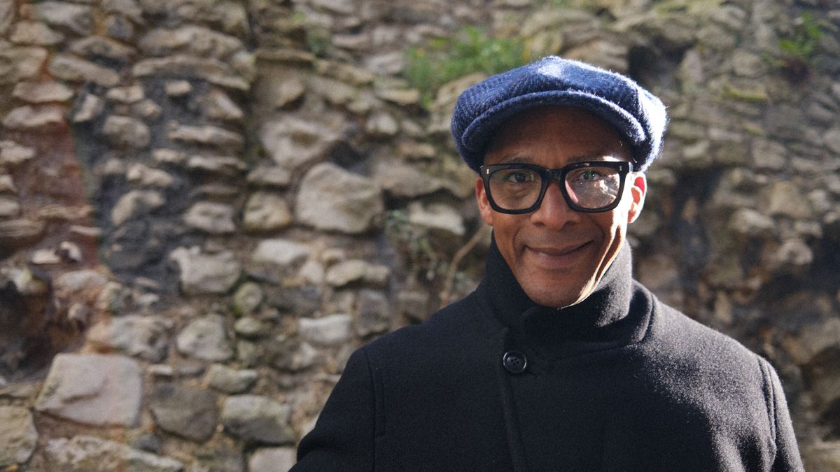 Jay Blades in front of a rock pile for Jay Blades: East End Through Time