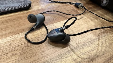Westone Audio Mach 60 in-ear monitors on a wooden worktop
