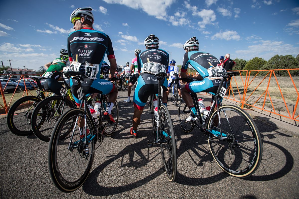 Team Jamis riders wait on the start line