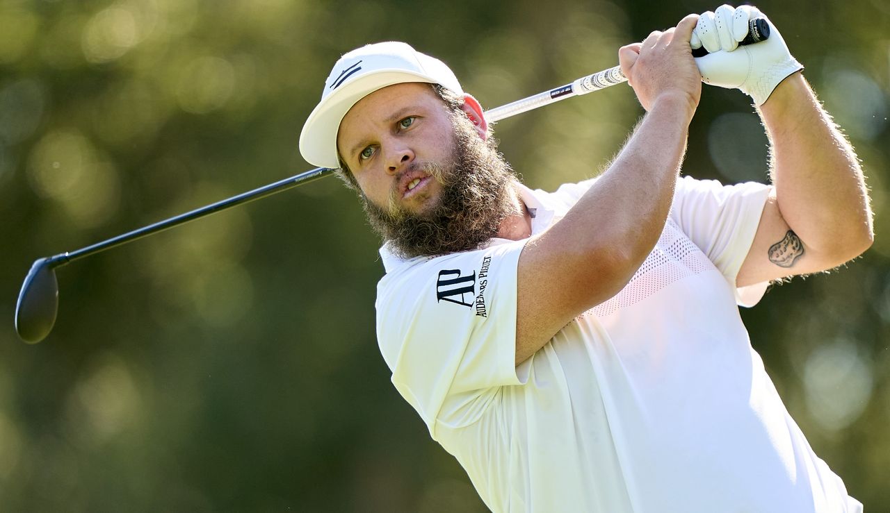 Beef hits his tee shot with a driver