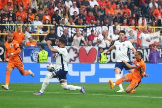 Xavi Simons of the Netherlands scores the first goal during the UEFA EURO 2024 semi-final match between Netherlands and England at Football Stadium Dortmund on July 10, 2024 in Dortmund, Germany. (Photo by Chris Brunskill/Fantasista/Getty Images)