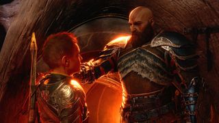 Kratos places his hand on Atreus' shoulder