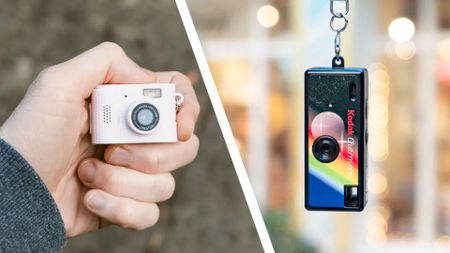 Kodak Charmera and Photo Creator Mini series 3 miniature keychain digital cameras, one in the hand, the other dangling from its keychain