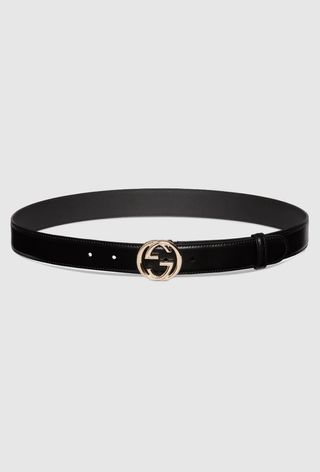 A picture of a Gucci belt. Adding a belt to outfits is a styling tip for petite women.