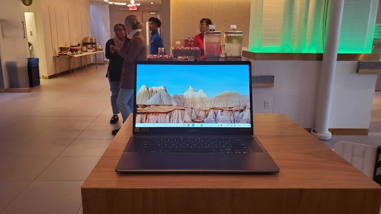 Chromebook Plus laptop on wooden table