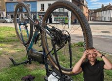 Gravel bike upside down on grass