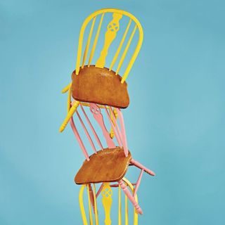 multicolour wooden chair stack