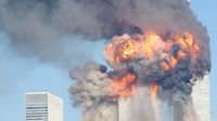 394261 12: A fiery blasts rocks the World Trade Center after being hit by two planes September 11, 2001 in New York City. (Photo by Spencer Platt/Getty Images)