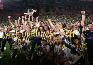 Fenerbahce players celebrate after winning the Turkish Cup in 2023.
