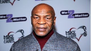 Getty Images NEWPORT BEACH, CALIFORNIA - DECEMBER 05: Mike Tyson attends the Mike Tyson Cares & We 2 Matter Fundraiser on December 05, 2021 in Newport Beach, California. (Photo by Phillip Faraone/Getty Images)