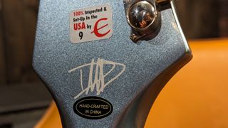 Dave Grohl's signature on the back of the headstock