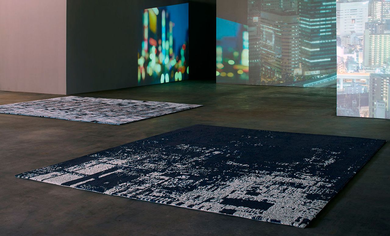 &#039;Skyfall&#039; and &#039;Midnight Escape&#039; themed rugs on the floor