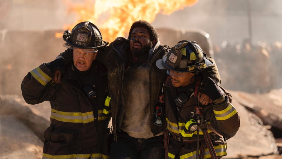 Mouch and Ritter helping a victim in the Chicago Fire episode of One Chicago&#039;s 2025 crossover