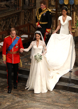 Prince William and his new bride Catherine Middleton walk down the aisle followed by best man Prince Harry and maid of honour Pippa Middleton at the close of their wedding ceremony at Westminster Abbey on April 29, 2011 in London, England