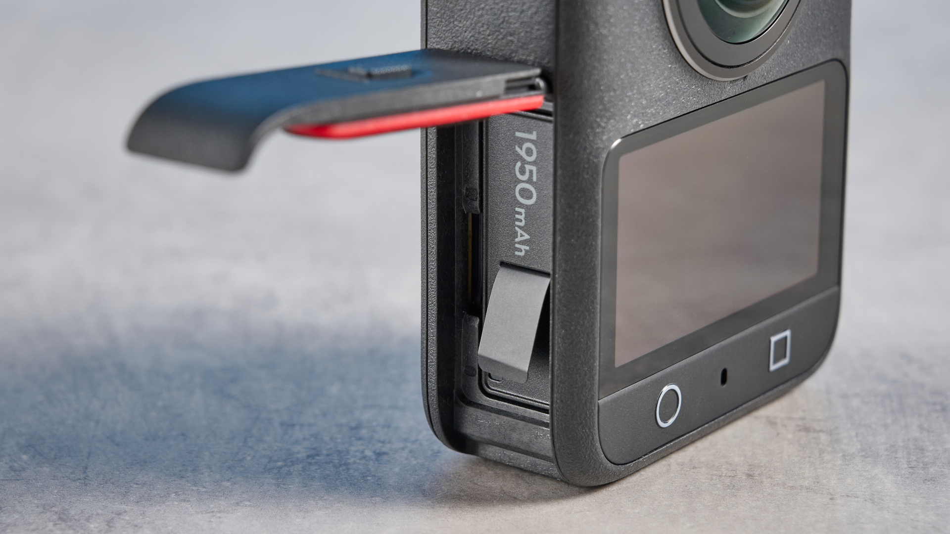 The DJI Osmo 360 battery hatch open