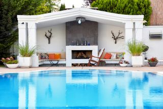 outdoor fireplace in a pool house