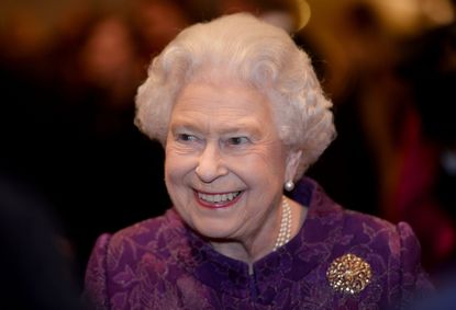 Queen Elizabeth II meets guests during a reception for the High Commissioners' Banquet