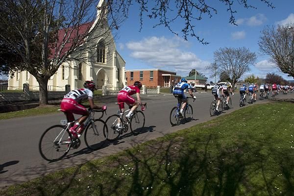Riders pass one of Westbury's many churches in perfect conditions for the final stage.