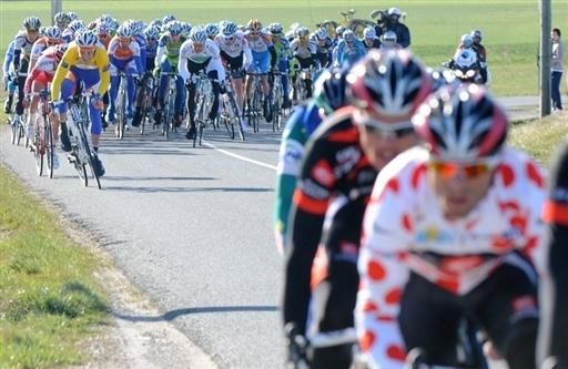 Lars Boom (Rabobank) shoots off the front of the peloton to make the split.