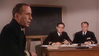 Humphrey Bogart in a navy uniform, on trial in The Caine Mutiny