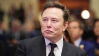 WASHINGTON, DC - NOVEMBER 13: Elon Musk listens as U.S. President-elect Donald Trump addresses a House Republicans Conference meeting at the Hyatt Regency on Capitol Hill on November 13, 2024 in Washington, DC. As is tradition with incoming presidents, Trump is traveling to Washington, DC to meet with U.S. President Joe Biden at the White House as well as meet with Republican congressmen on Capitol Hill. (Photo by Andrew Harnik/Getty Images)