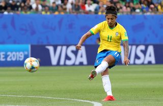 Cristiane kicking the ball