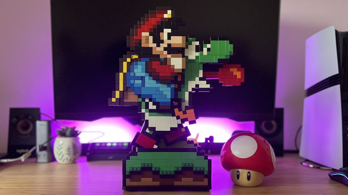 Lego Super Mario &amp; Yoshi set on a wooden desk with toad lamp