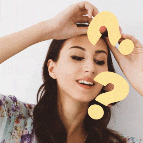 Woman with flashing question marks