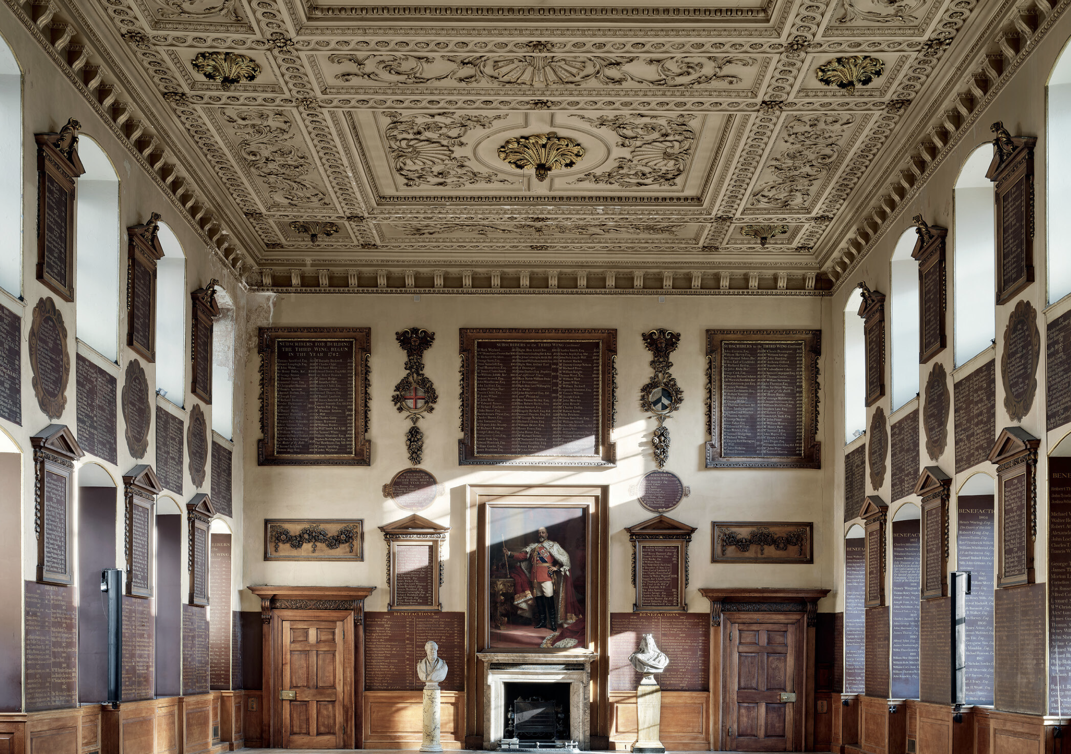 Fig 1: A view of the Great Hall, with its tiers of donor boards and vast plaster ceiling. St Bartholomew’s, Smithfield, London. ©Will Pryce for Country Life